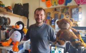 Nick Hardman with two of his custom-made teddy bears