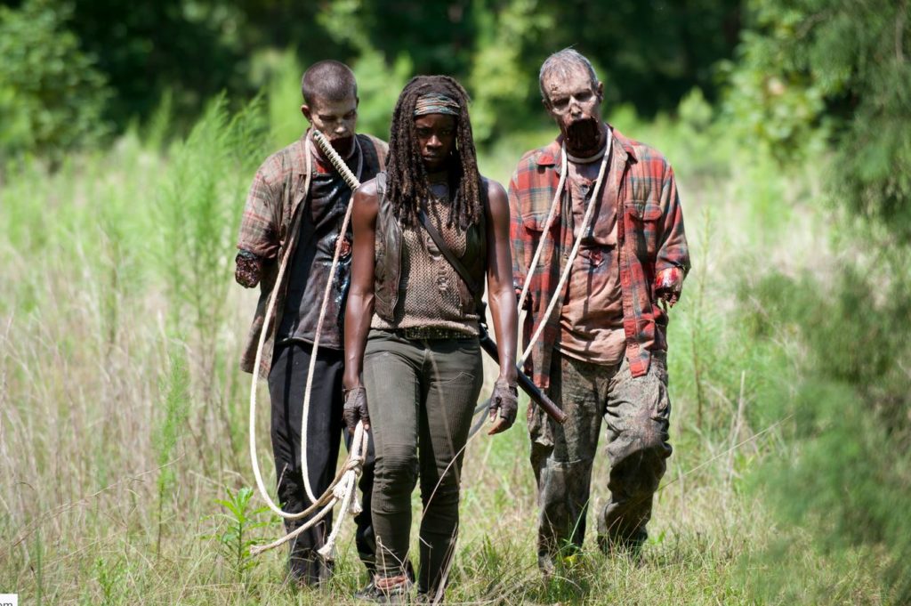 Michonne (Danai Gurira) has two zombies on leashes in this episode of AMC’s television series “The Walking Dead.”