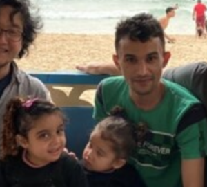 Youssef Al-Khoudor and daughters Rouaa and Diala 